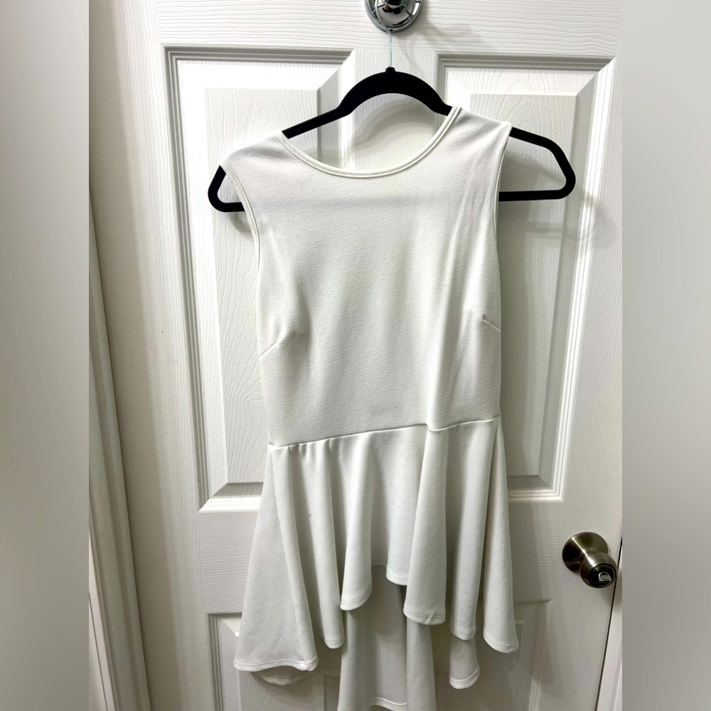 White peplum blouse with exposed back: size medium